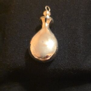 Silver Perfume Bottle with Luminous Finish
